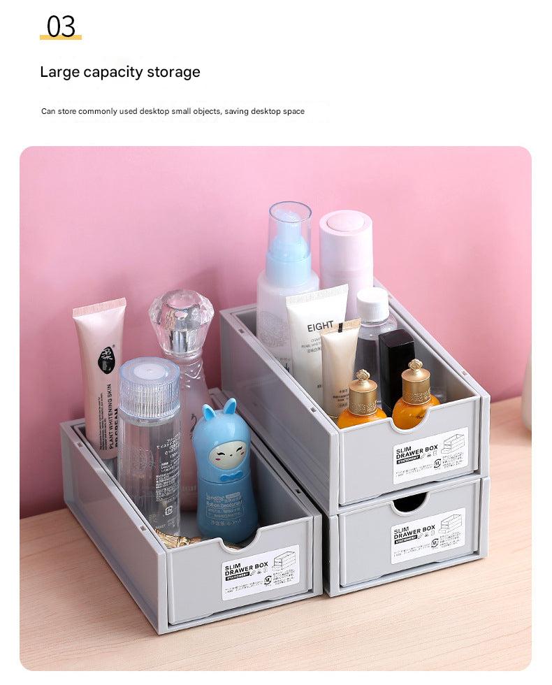 Side view of grey desk organiser in use