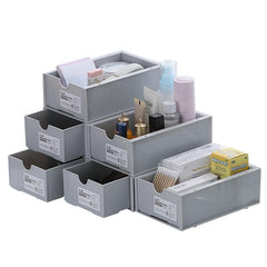 Side view of grey desk organiser in use