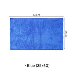 Microfiber cleaning cloth on furniture surface