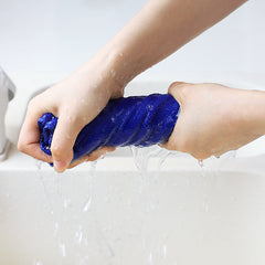 Purple microfiber cleaning cloth with cleaning supplies