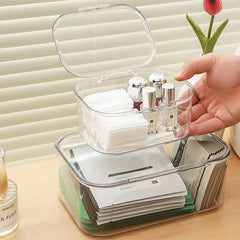 Close-up of clear storage box for stationery and snacks