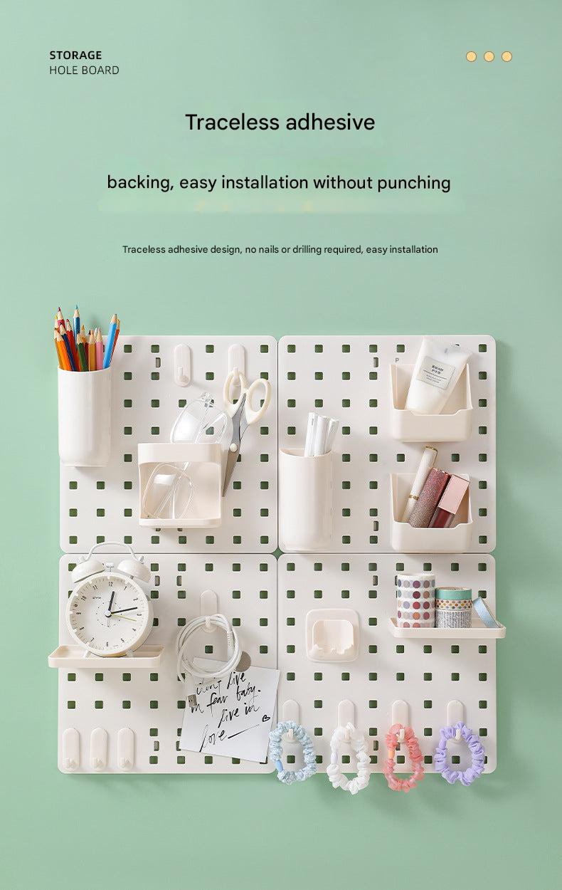 Wall-mounted pegboard organiser with compartments photo