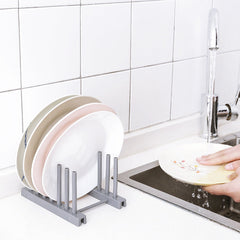 modern grey utensil rack in kitchen