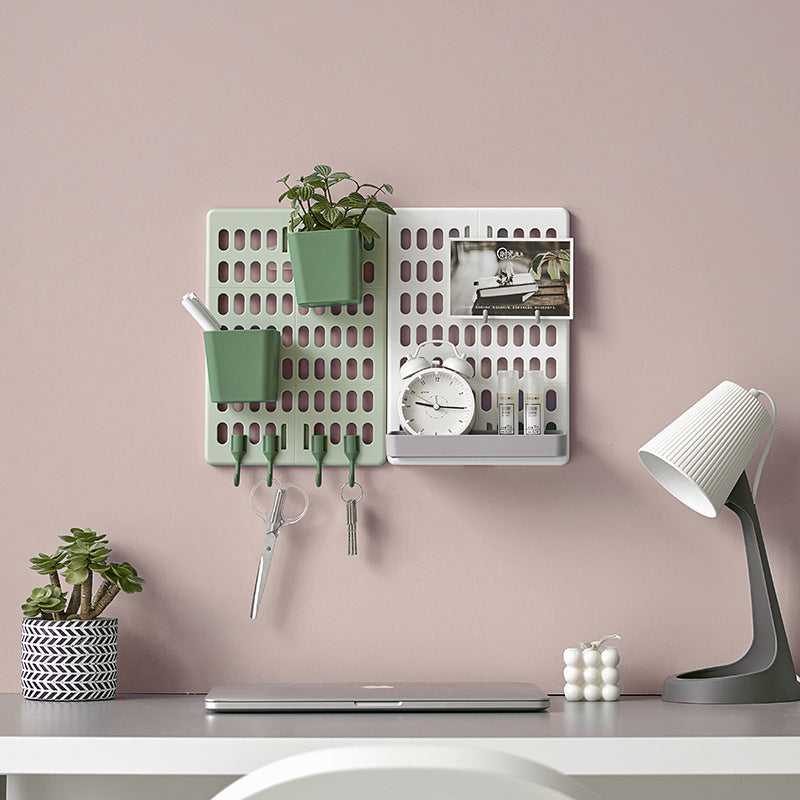 Stylish storage rack mounted on bathroom wall