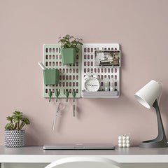 Stylish storage rack mounted on bathroom wall