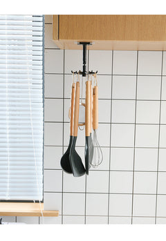 kitchen tools on rotating hooks