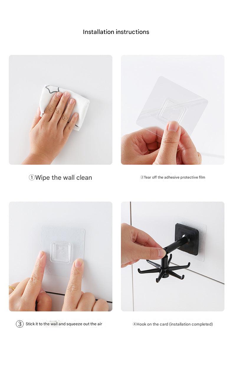 black adhesive hook holding utensils