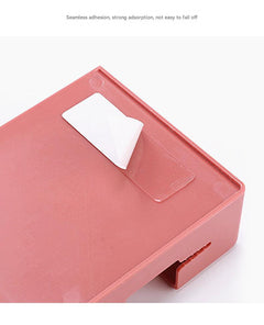 User using the remote control organiser box