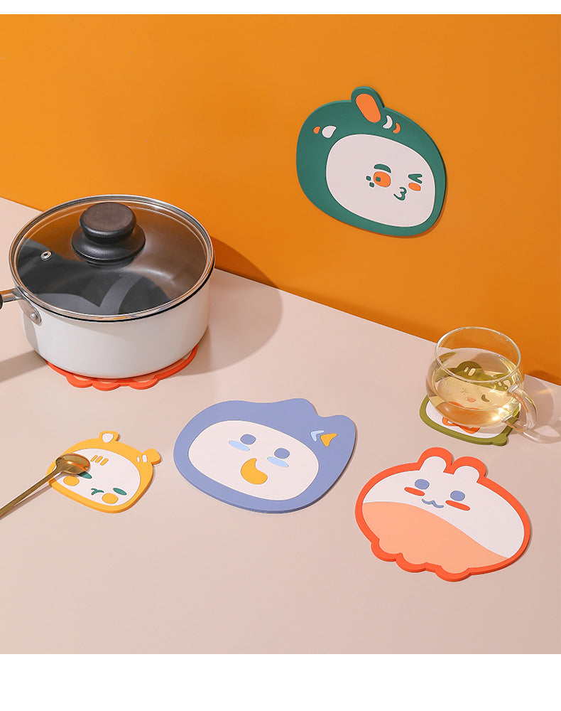 Close-up of cartoon table mats on a dining table