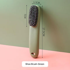Overhead view of cleaning brush on shoes