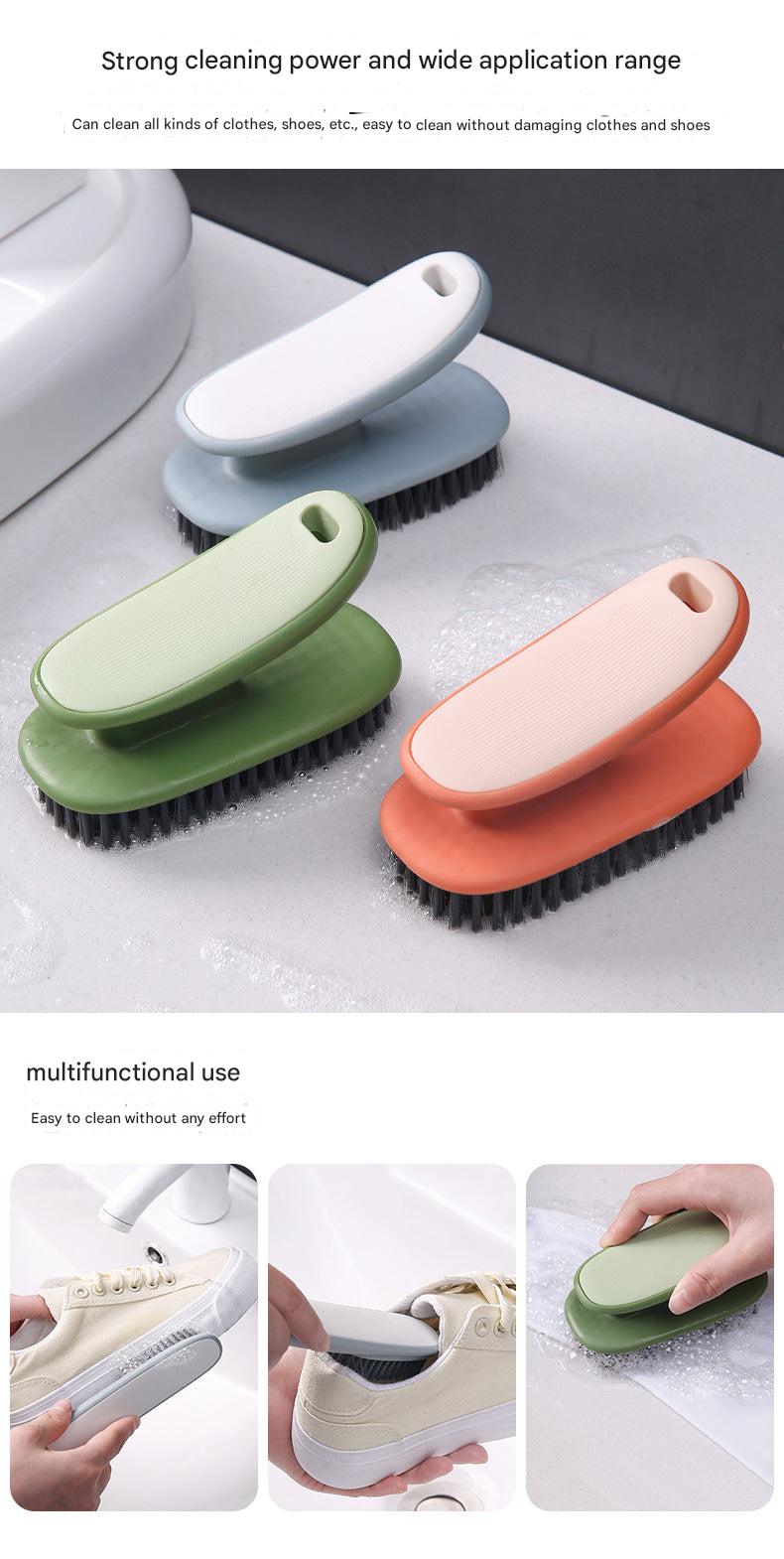 Hand holding the multifunctional shoe cleaning brush