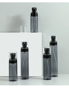 Various angles of a travel-friendly spray bottle
