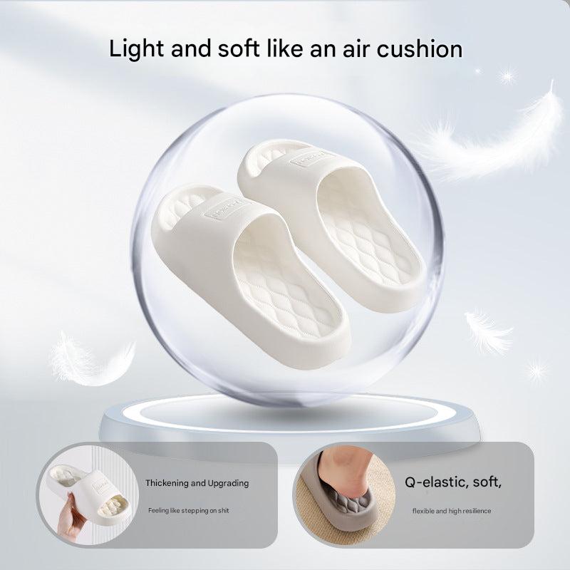 Pair of unisex anti-slip slippers on a floor