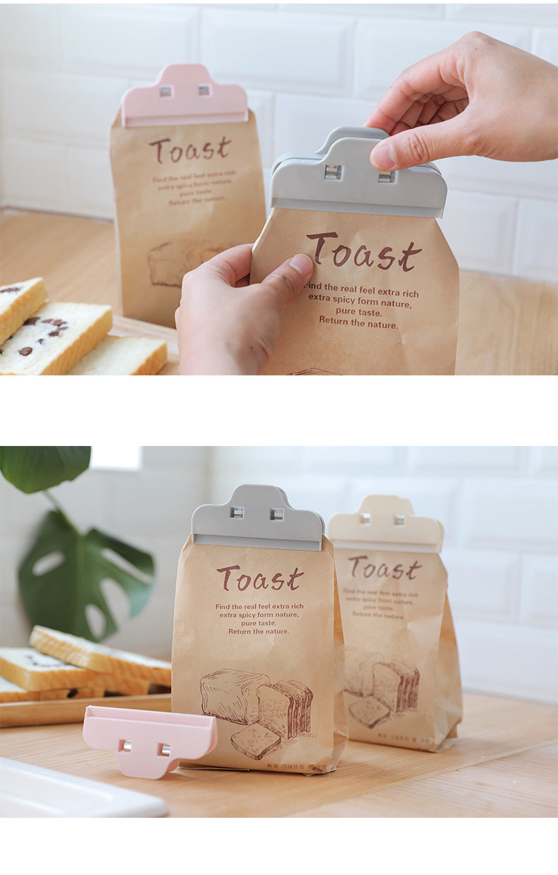 Colourful food sealing clips in kitchen setting
