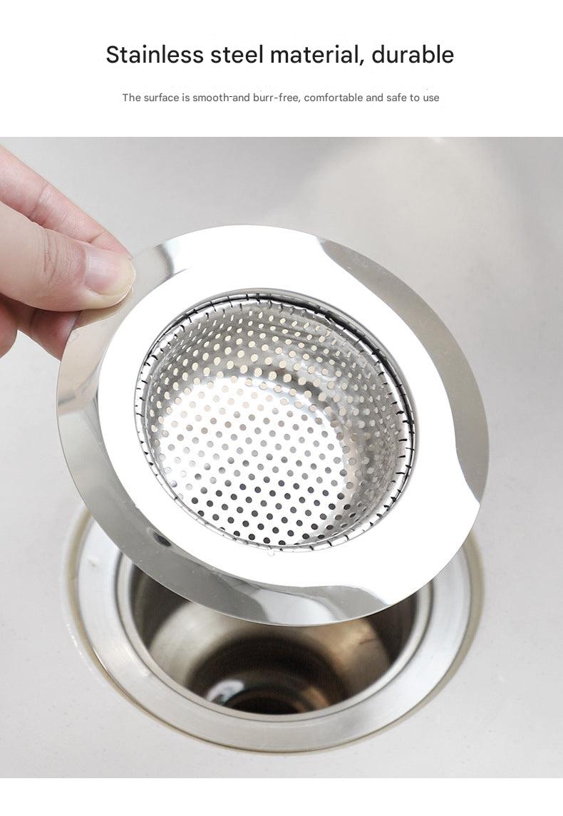 Close-up of stainless steel kitchen sink strainer on counter