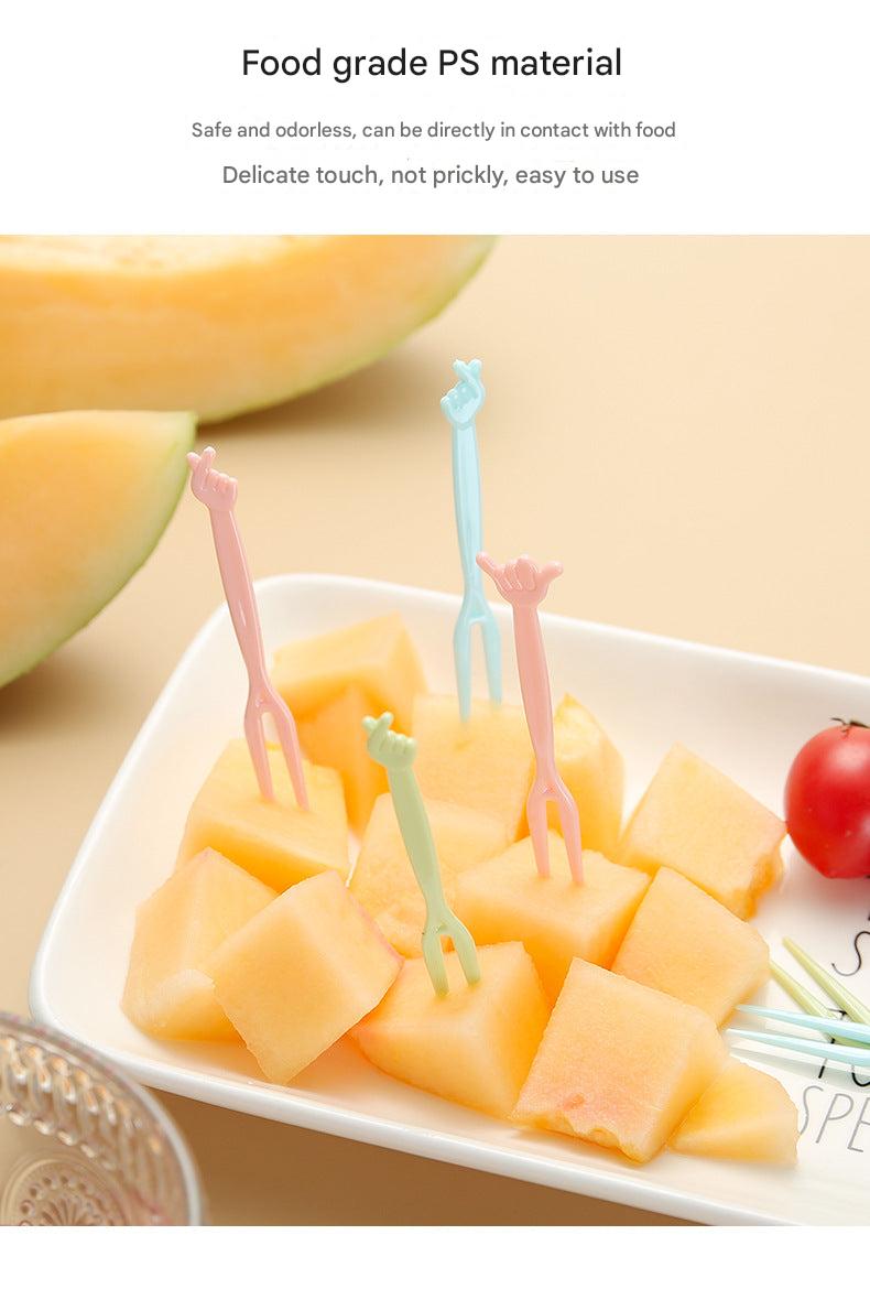 colorful forks shown with desserts
