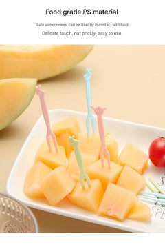 colorful forks shown with desserts