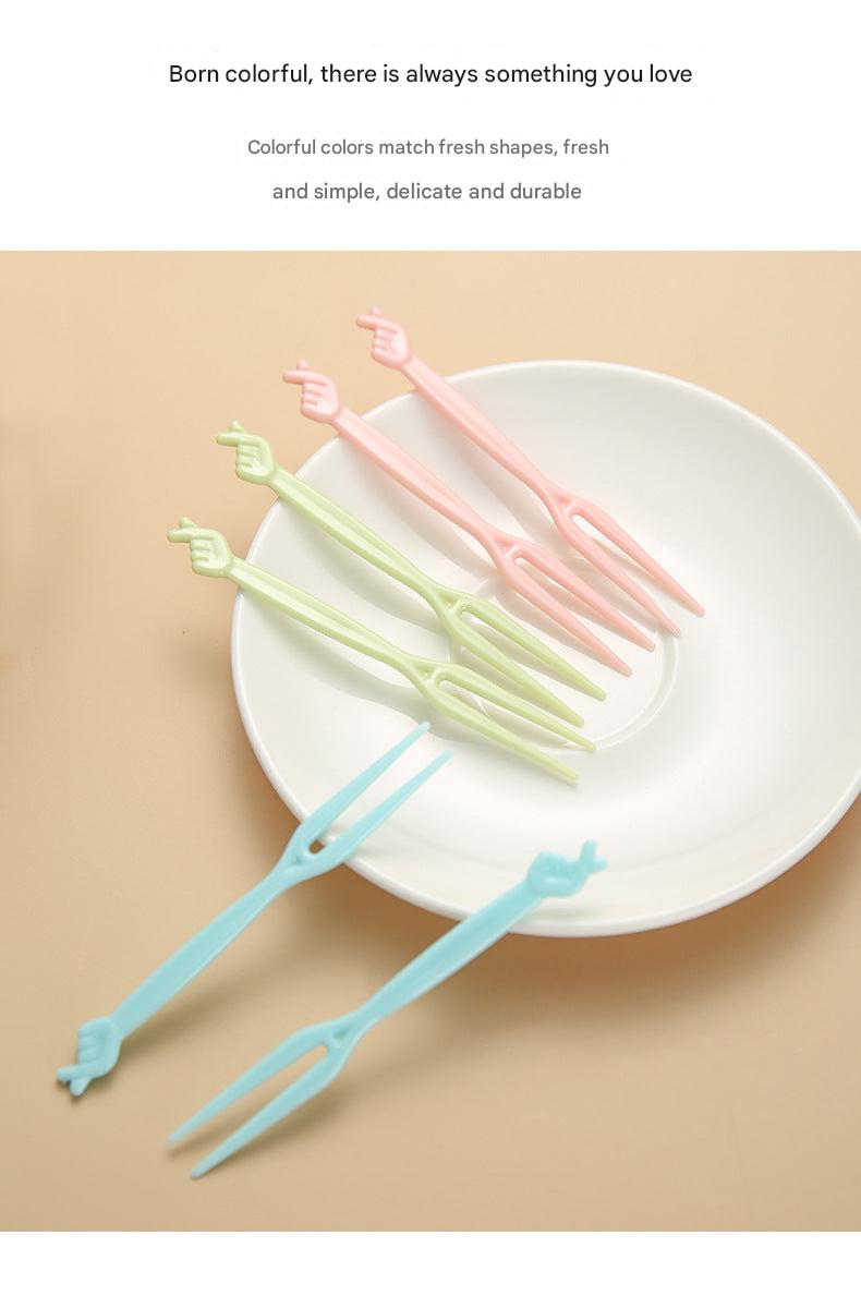 disposable fruit forks in a picnic setup