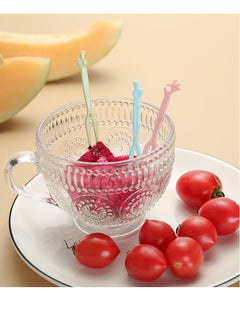 assorted disposable forks in vibrant colors