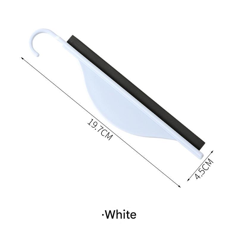 squeegee showcased on a bathroom surface