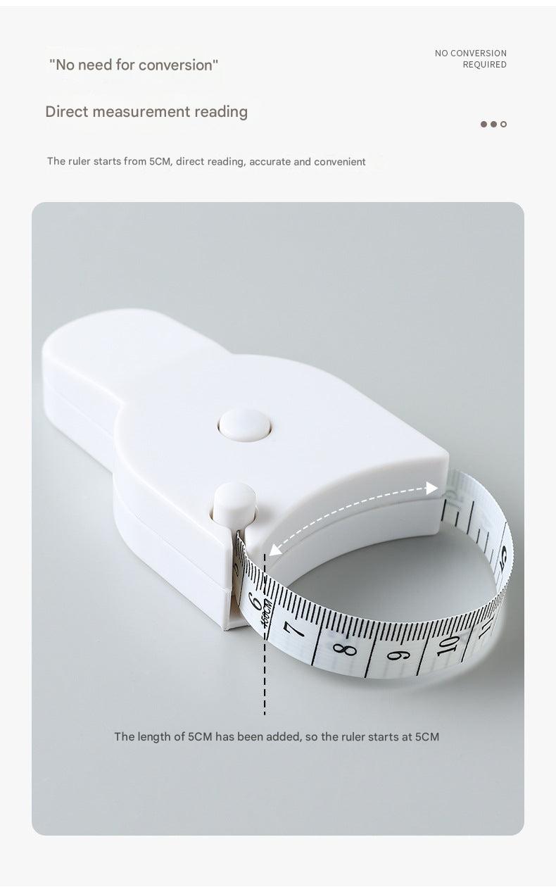 Flexible measuring tape in use by a person