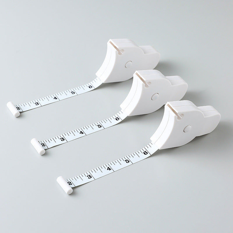 Flexible measuring tape in use by a person