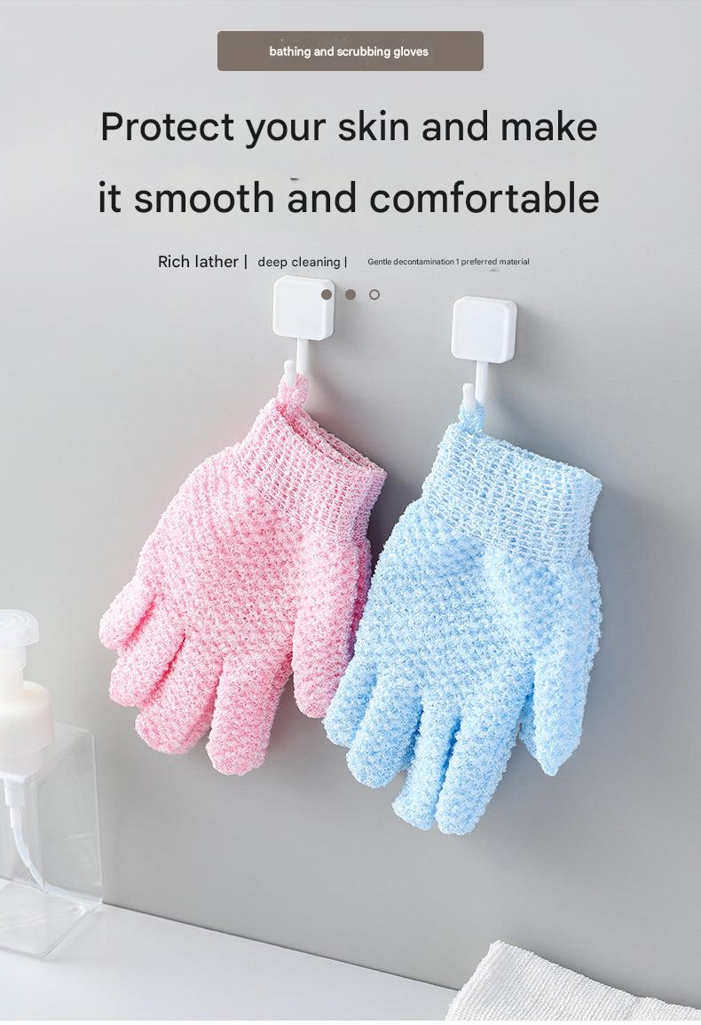 Detailed view of pink bath gloves