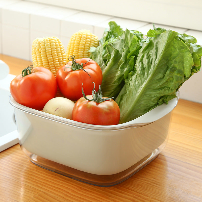 yellow vegetable washing basket showing drainage