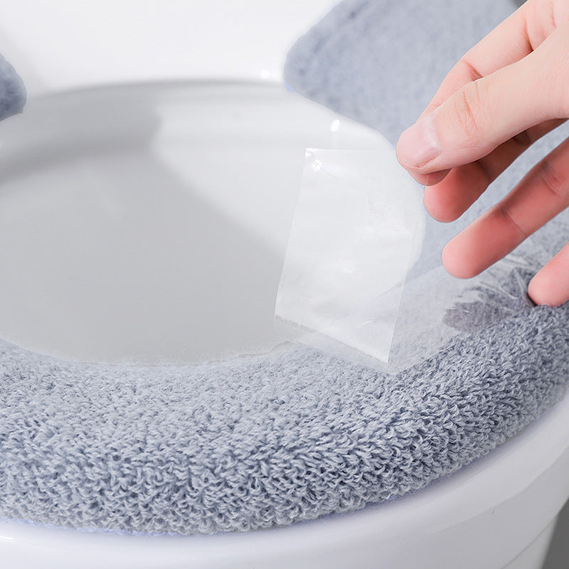 Stylish toilet seat cover displayed at home
