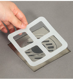 Close-up of bathroom drain filter mat