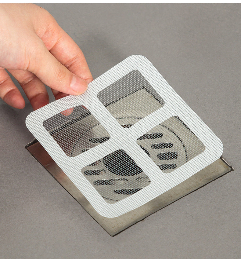 Close-up of bathroom drain filter mat