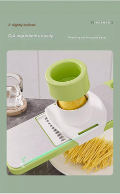 multicolor vegetable display next to grater