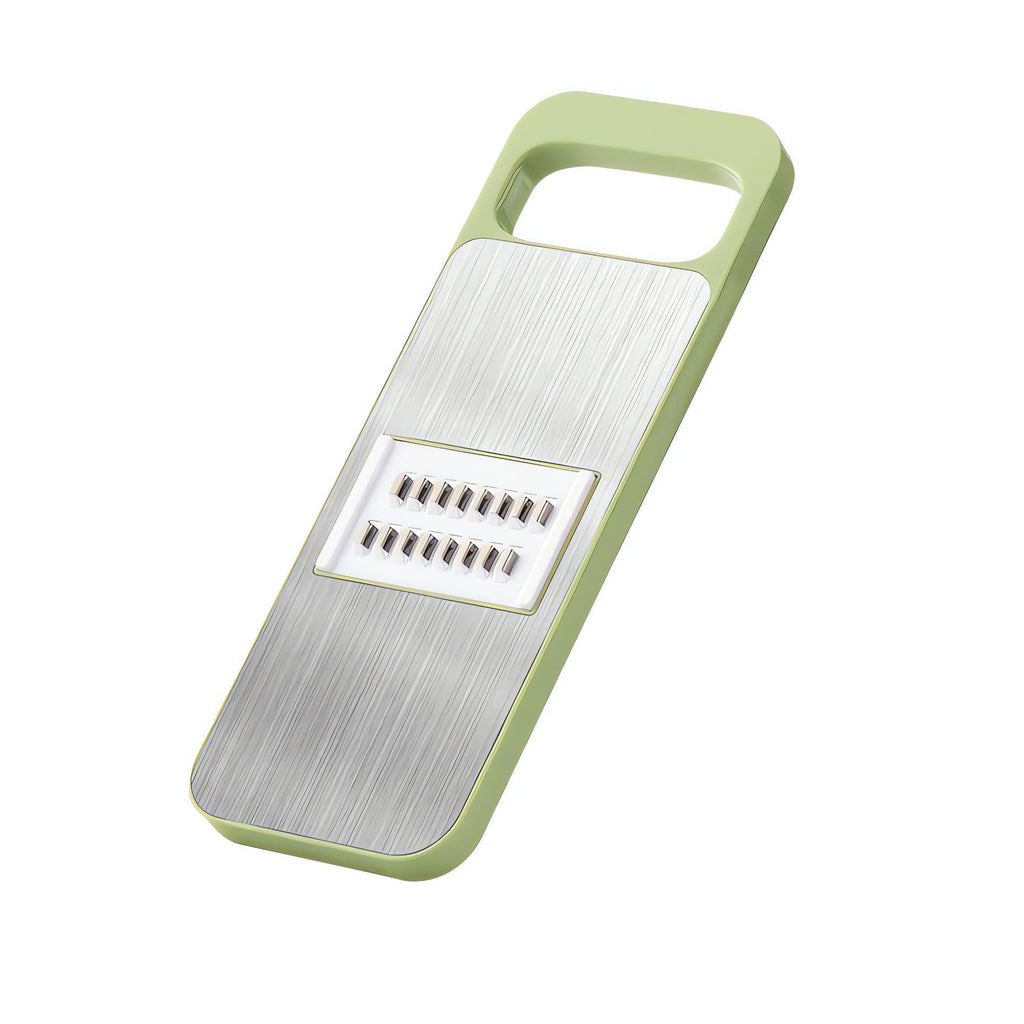 grater with shredded vegetables