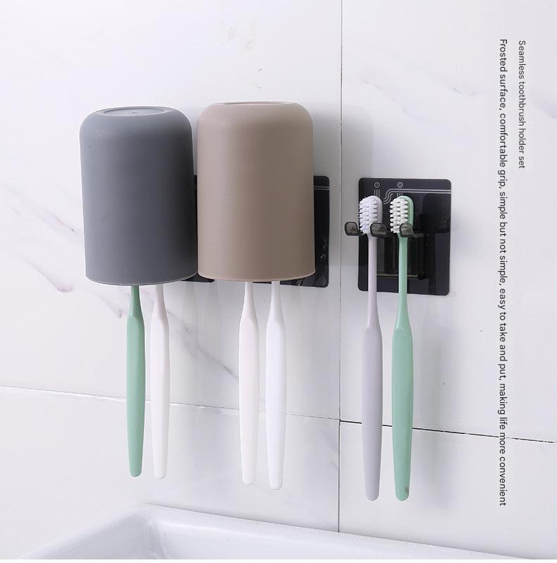 Suction cup toothbrush holder displayed in grey