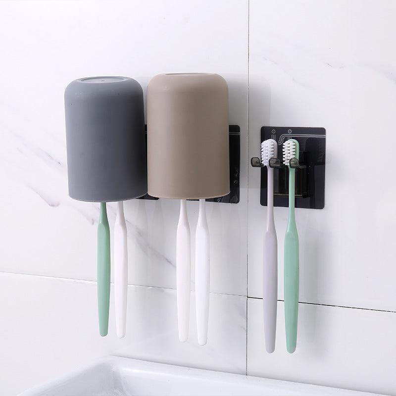 Suction cup toothbrush holder displayed in grey