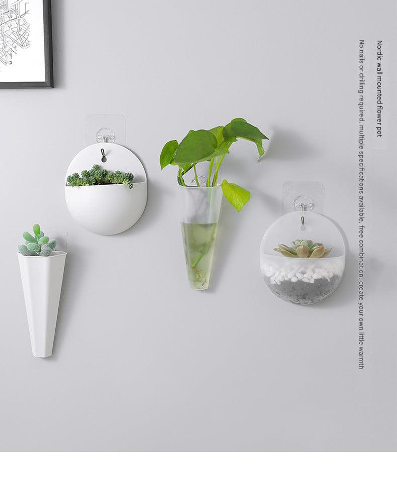 Stylish wall-mounted planter with indoor plants
