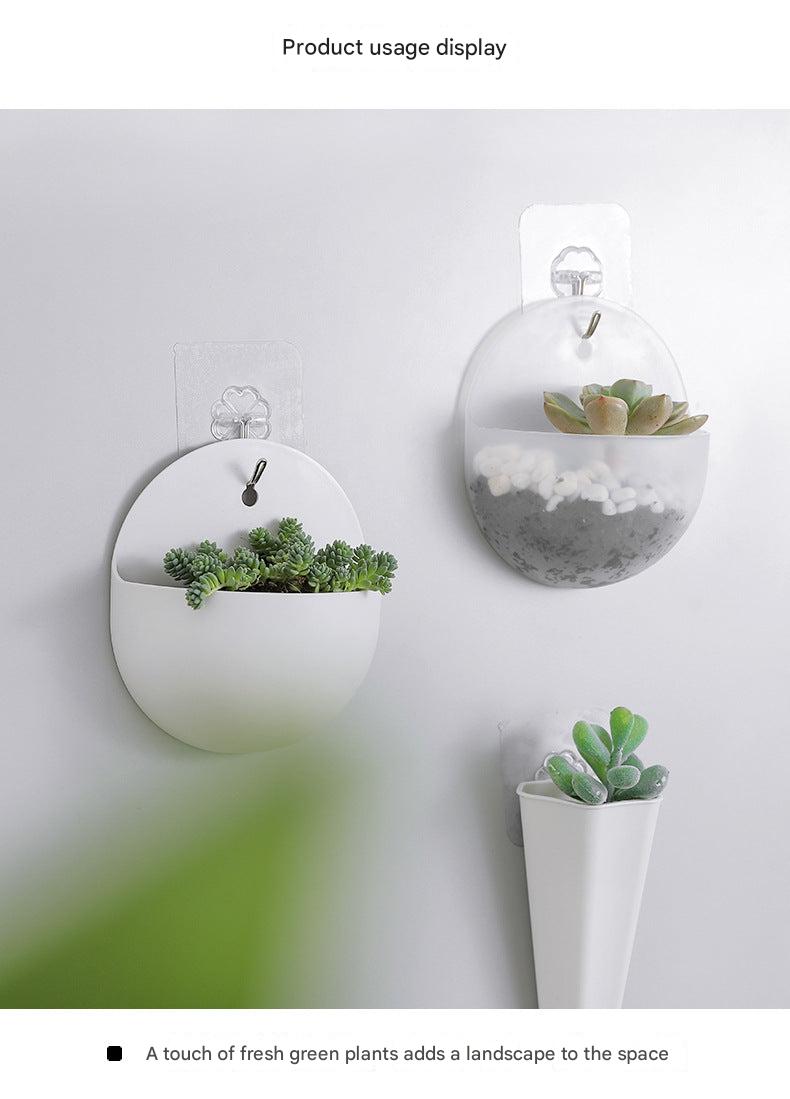 Installation of wall-mounted planters in modern decor