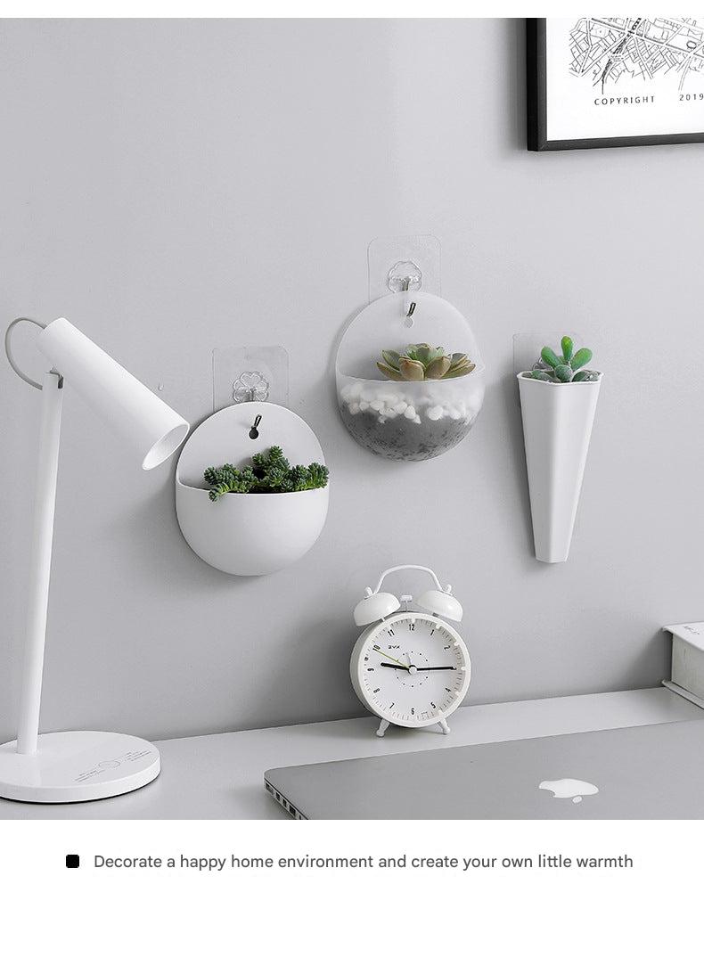 Vertical wall planter arrangement in a home