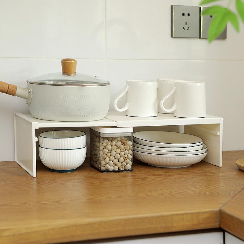 organised kitchen storage rack displaying herbs