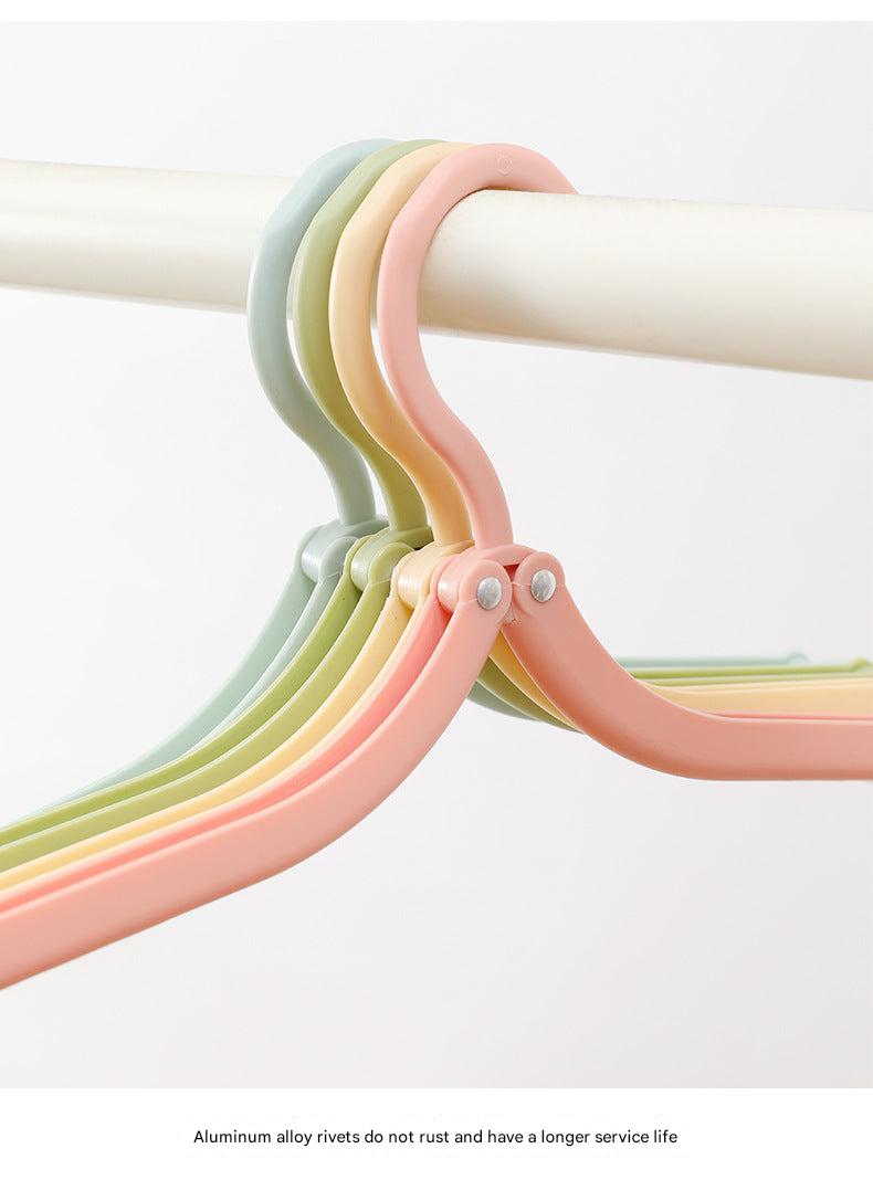 Innovative folding hanger displayed on a rack