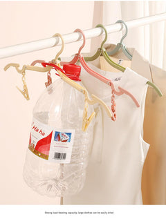 Compact Travel Folding Clothes Hanger in use