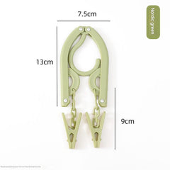 Compact clothes hanger in suitcase