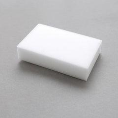 Magic Sponge Eraser alongside cleaning supplies