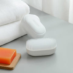 Compact and ergonomic laundry brush design