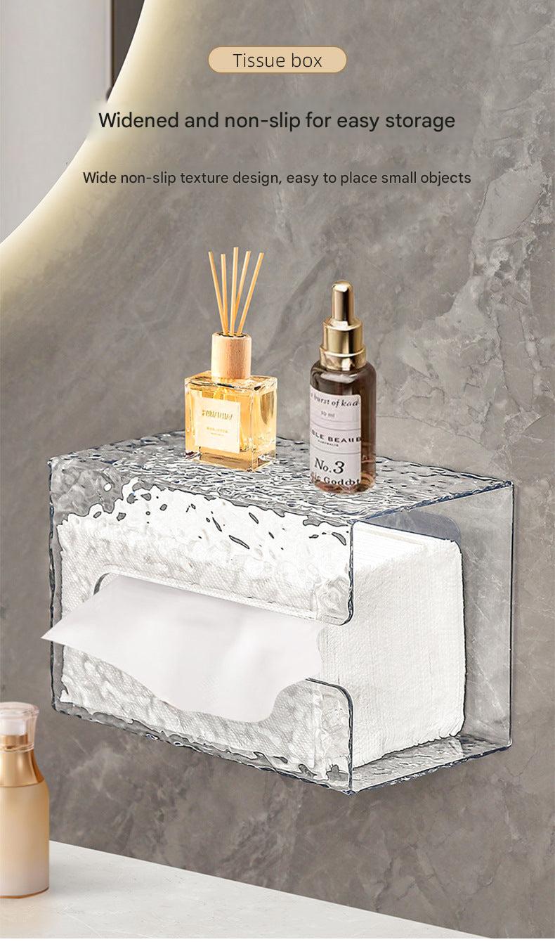 wall-mounted tissue dispenser in bathroom