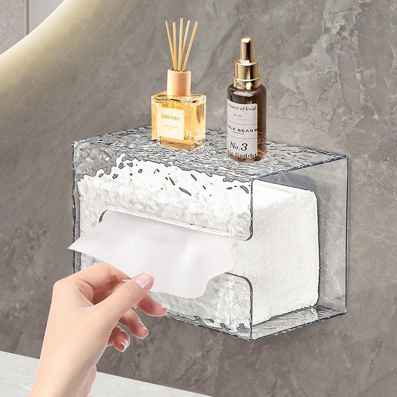wall-mounted tissue dispenser in bathroom