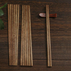 unpainted wooden chopsticks with nachos