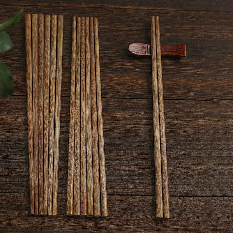 unpainted wooden chopsticks with nachos