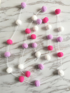 soft ball string decorations in a child's room image 10
