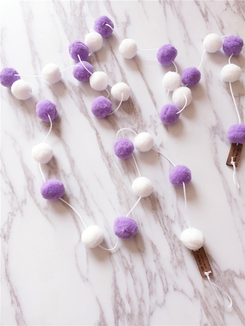 window display with colour ball strings for kids image 8
